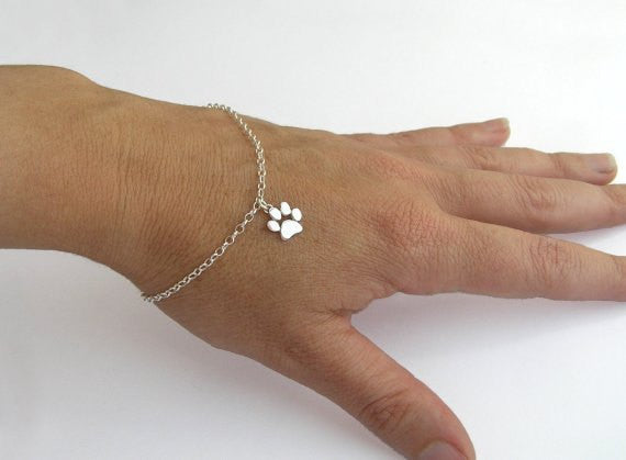 Silver dog shop paw bracelet